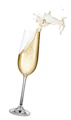 Wall murals Alcohol glass of champagne with splash