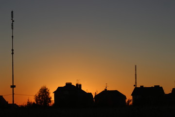 silhouette of buildings at sunset