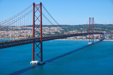 25 of April Bridge (Ponte 25 de Abril) – a suspension bridge over Tegus river. Lisbon. Portugal