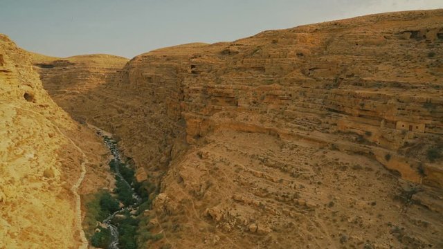 Kidron river valley. Panorama viewed from terrace of Greek Orthodox monastery The Great Lavra of St. Sabbas the Sanctified (Mar Saba) in Judean desert. Palestine, cca. 2015