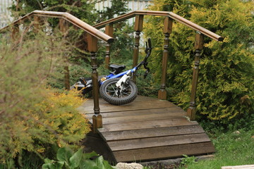 Children's Bicycle on a wooden bridge