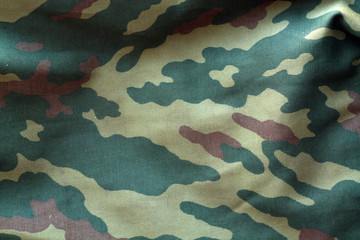 Camouflage cloth with blur effect.