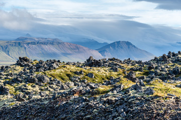 Lava field and a mountain range in western Iceland