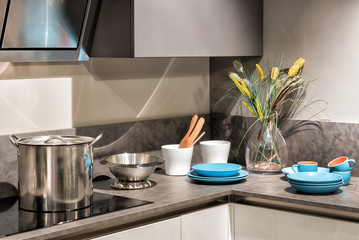 Kitchen utensils and cookware on the counter
