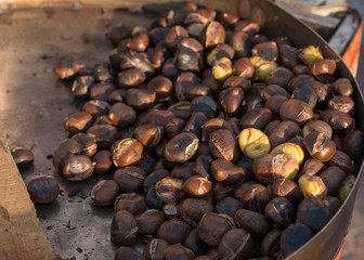 Roast chestnuts cooked over the red-hot grill,