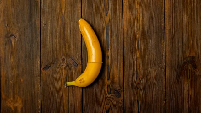 choice contraception against aids, banana with condom for safe sex and health