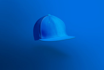 Blank cap in perspective view. Snapback on background. Blank baseball snap back cap for your design. Mock up hat cap for you logo, brand identity etc.