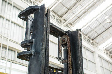 Forklifts in warehouse.
