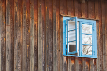 Obraz na płótnie Canvas old wooden window on a wall