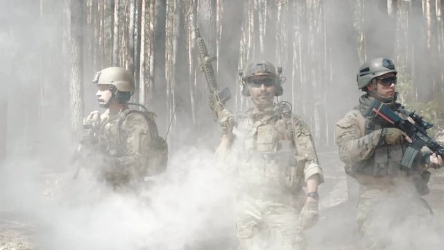 Soldiers epic stand in smoke in full exchange