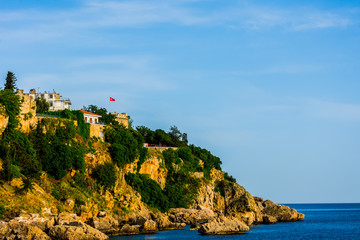 The hill located next to the sea with the trees in Antalya