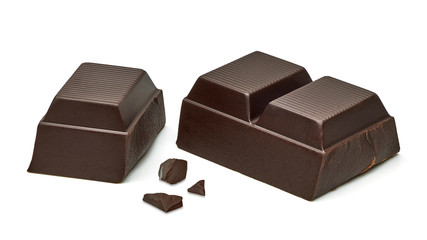 Broken chocolate bars and pieces isolated on white background