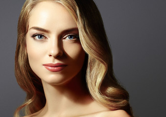 Fototapeta premium Beautiful blonde girl portrait, woman face with perfect long hairstyle.