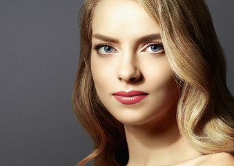 Fototapeta premium Beautiful blonde girl portrait, woman face with perfect long hairstyle.
