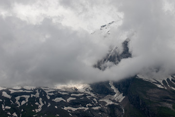 Fototapeta na wymiar Landscape of mountain in the clouds in Austria Alps