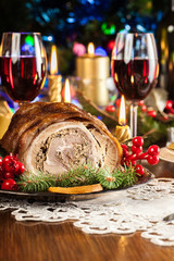 Traditional italian porchetta on festive table
