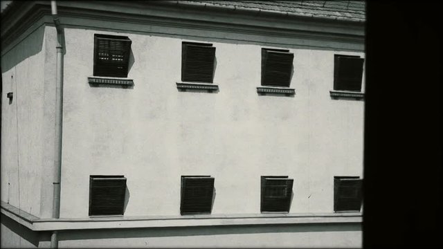 Prison building from eastern bloc during communist era (1940s, 1950s).
Archive, black and white footage.