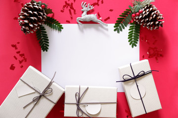 top view of gift boxes on red background with white space for your text.