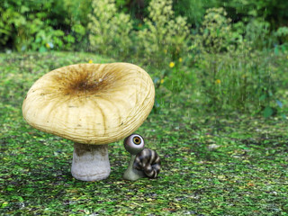 3D rendering of a cartoon snail in the rain.