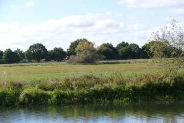 green bench and landscape