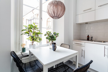 fancy kitchen interior small table by the window