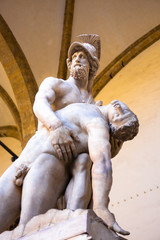 The sculpture Patroclus and Menelaus is located in Florence, at the center of the Loggia dei Lanzi, Piazza della Signoria. Greek statue of the 4th century BC, found in the Forum of Trajan in Rome.