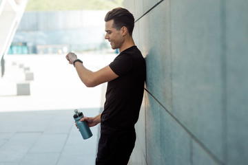 Man looking at smartband's display