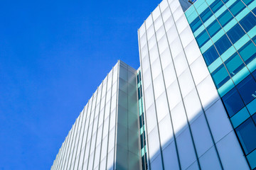 Fototapeta na wymiar Modern office building with blue skies.