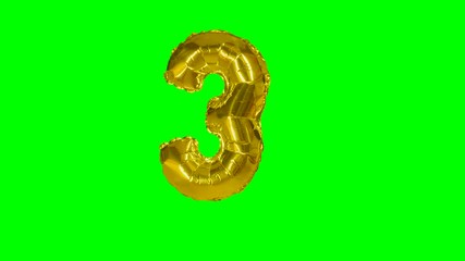 Number 3 three years birthday anniversary gold balloon floating on green screen