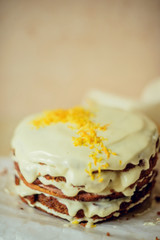 Homemade carrot cake on light background. The concept of autumn tea.
