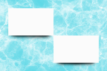 Empty white paper sheet on Turquoise marble background,Mock up for design.