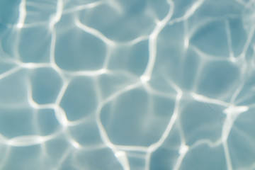 Obraz premium Blurred Beautiful Abstract water background, Swimming pool rippled.