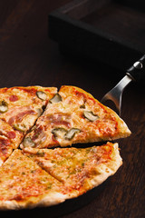 pizza with ham and cheese