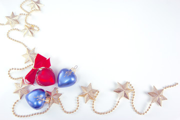 Golden stars, red and blue hearts. Christmas and New Year holiday background concept. Blank space for greetings.