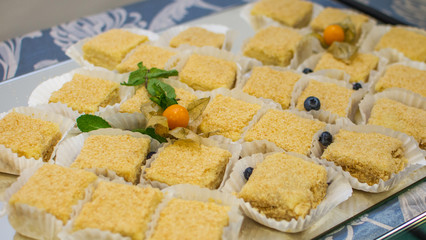 delicious miniature cakes on a buffet table