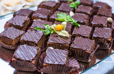 delicious miniature chocolate cakes on a buffet table