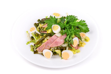 Salad of ham, green beans, lettuce and eggs