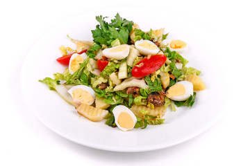 Salad of fried potatoes, eggs and lettuce