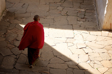 Monk walking in monastry