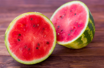 Fresh sliced watermelon wooden background