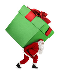 Santa Claus carrying huge christmas gift isolated on white background