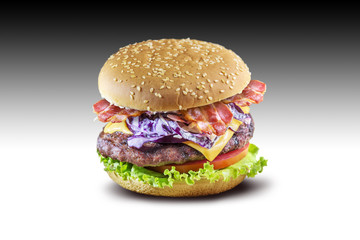 Hamburger with cheese salad tomato bacon and coleslaw