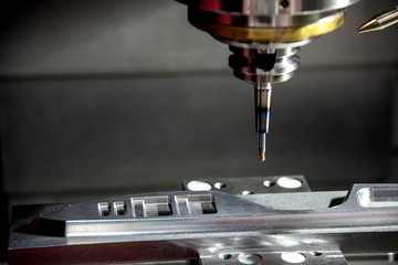 The CNC milling machine cutting the injection mold part by solid ball end mill tool.Mold...