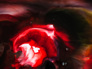 Abstract background, various pigments and dyes create a rich texture, blurred color background,