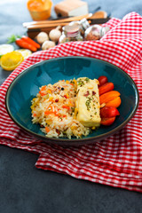 Andalusian fish, saffron rice with vegetables