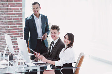 business team working with documents in a modern office.