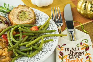 Roasted pork loin stuffed with prosciutto and broccoli.