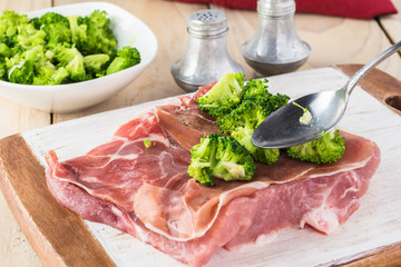 Ingredient for roasted pork loin stuffed with prosciutto and broccoli