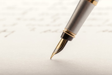 Fountain Pen on Written Page