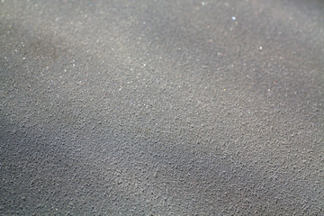 Frost and snow with blur effect on sun.